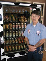 Lou Giampa, a service tech for Tomdra Vending Inc., in Tucson, Ariz., installs a combination machine offering frozen food, pastries and bottled water.