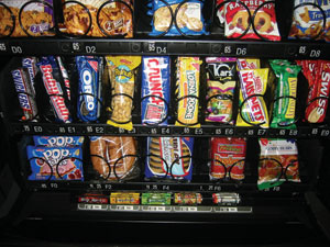 This is an actual machine facing in a major metropolitan area. Candy offerings have been significantly reduced due to cost increases.