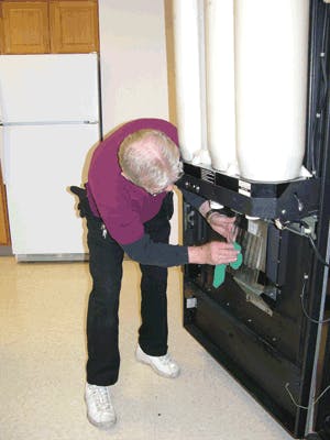 Service personnel need to have clean hands when touching machine parts that dispense product.