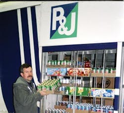Driver Jay Hathaway loads a truck at P &amp; J&apos;s Vending. The telemetry allows the company to know specifically what the location needs.