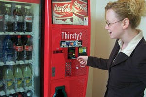 Consumers are paying for more purchases with credit and debit cards. Cold drink machines have taken the lead thus far with card readers.