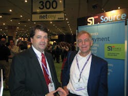 At the Self Service & Kiosk Expo at the Jacob Javits Convention Center in New York city, N.Y., Bill Lynch, left, of Source Technologies discusses the company’s latest developments with Jim Phelps of CompuShop Services. At the Self Service & Kiosk Expo at the Jacob Javits Convention Center in New York city, N.Y., Bill Lynch, left, of Source Technologies discusses the company’s latest developments with Jim Phelps of CompuShop Services.
