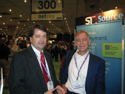 At the Self Service &amp; Kiosk Expo at the Jacob Javits Convention Center in New York city, N.Y., Bill Lynch, left, of Source Technologies discusses the company&rsquo;s latest developments with Jim Phelps of CompuShop Services.