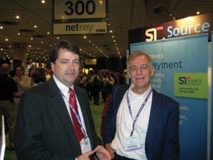 At the Self Service &amp; Kiosk Expo at the Jacob Javits Convention Center in New York city, N.Y., Bill Lynch, left, of Source Technologies discusses the company&rsquo;s latest developments with Jim Phelps of CompuShop Services.