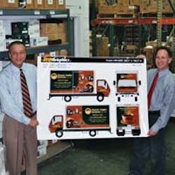 The last big project for John Malizio, left, and Charles Chiarello was adding custom designed graphics to their vehicles to further enhance their professionalism.
