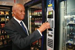 Mack Wilbourn tests a credit card reader at the Atanta airport. Mack Wilbourn tests a credit card reader at the Atanta airport.