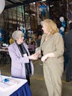 Edith Leonian, left, of Concession Services Inc. greets Diana Tomaskas, food business representative of DPI Midwest, based in Arlington Heights, Ill.