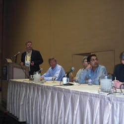 Panelists field a question. At left are Glen Butler of Crane Merchandising Systems, moderator Mike Kasavana of Michigan State University, Greg Hasslinger of InOne Technology, Anant Agrawal of Cantaloupe Systems, and Doug Haddon of MEI.