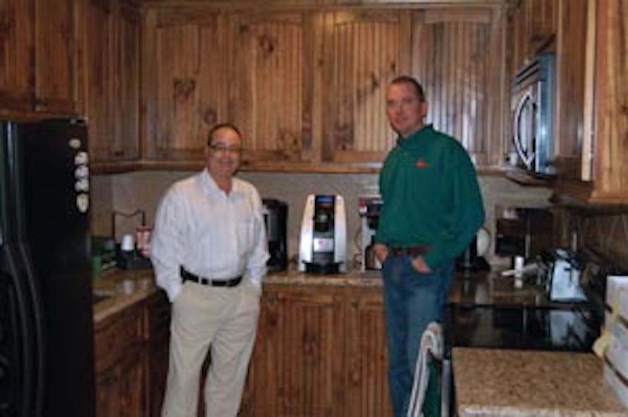 Paul Endres, left, and Mike Ferguson applied lessons they learned at a large regional OCS company to launch Southern Refreshment Services in greater Houston, Texas in 1991.