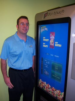 John Hickey of Next Generation Vending & Food Service Inc. reviews the options for buying Trail Mix from the Diji-Touch machine. John Hickey of Next Generation Vending & Food Service Inc. reviews the options for buying Trail Mix from the Diji-Touch machine.