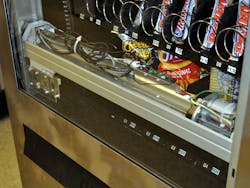 A digital camera rides on a track in the machine and takes pictures of individual products. A digital camera rides on a track in the machine and takes pictures of individual products.