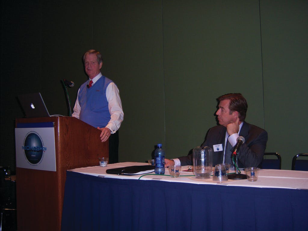 Dan Mathews of NAMA, left, and John Healy of Healy Schulte present the findings of the industry and consumer image research during the NAMA OneShow in Chicago.