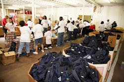 Claremont, North Carolina, volunteers joined with the Second Harvest Food Bank of Metrolina to fill 1,500 take-home backpacks with food for needy children.