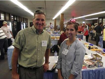 Glenn Auerbach of Nestle USA and Aimee Jobe of Apple Automatic discuss business at the 32nd Annual Lieberman Companies Vending Food & Equipment Show in Bloomington, MN.