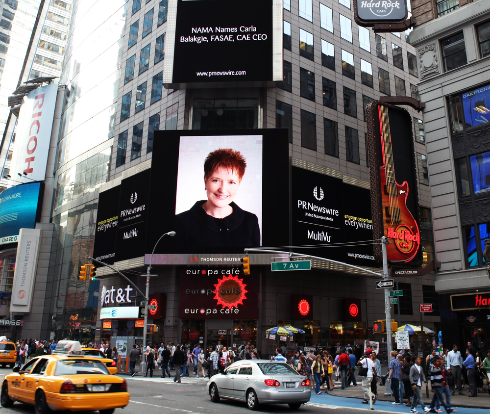 The Jumbotron in New York City's Times Square presents Carla Balakgie's photo.