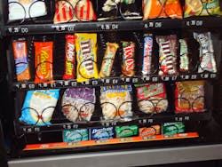 All glassfront snack machines at Black Tie Services are retrofitted with the gum trays from Vendors Exchange International Inc.