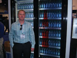 Keith Wentzell of Aramark Refreshment Services examines a transparent video display on a beverage cooler from LG Solutions during the Digital Signage Expo in Las Vegas. Keith Wentzell of Aramark Refreshment Services examines a transparent video display on a beverage cooler from LG Solutions during the Digital Signage Expo in Las Vegas.