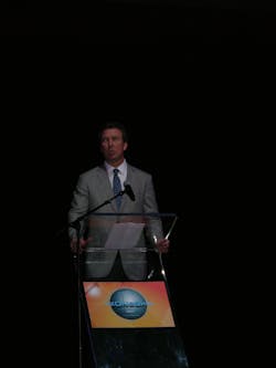 Brad Ellis welcomes attendees to the 2012 National Automatic Merchandising Association (NAMA) OneShow in Las Vegas at the opening ceremony, introducing the winners of the NAMA Industry Awards.