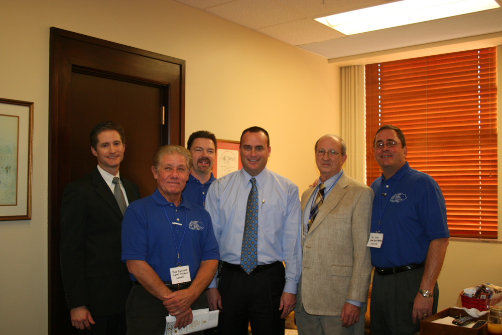 Tod Griffin, left, Kentucky Retail Federation, Mike Alexander, J. Michael Alexander & Associates, Lexington, Ky.; Rob Taylor, ProVend, Louisville, Ky.; R.J. Palmer, D-Winchester, Ky.; Ulanda Price, Modern Vending Co., Somerset, Ky.; and Ron White, Total Vend, Louisville, Ky.