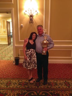 Melissa Johnson, Harold W. Young product brokerage, awards Steve Foley, Foley Food & Vending Inc. in Norwood, Mass., the Harry Wishart Award. Melissa Johnson, Harold W. Young product brokerage, awards Steve Foley, Foley Food & Vending Inc. in Norwood, Mass., the Harry Wishart Award.