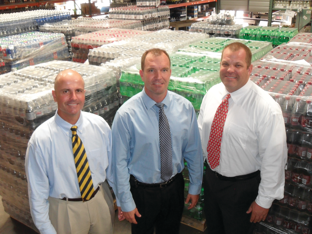 Partners Wade Stooks, left, Kevin Van Hazel and Chuck Walton have progressively moved to larger warehouses since starting the company from a garage.