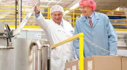 President of Promotion In Motion, Michael Rosenberg, gives U.S. Representative Rush Holt a peek into the cooking processes around the Promotion In Motion facility in Somerset, NJ. President of Promotion In Motion, Michael Rosenberg, gives U.S. Representative Rush Holt a peek into the cooking processes around the Promotion In Motion facility in Somerset, NJ.