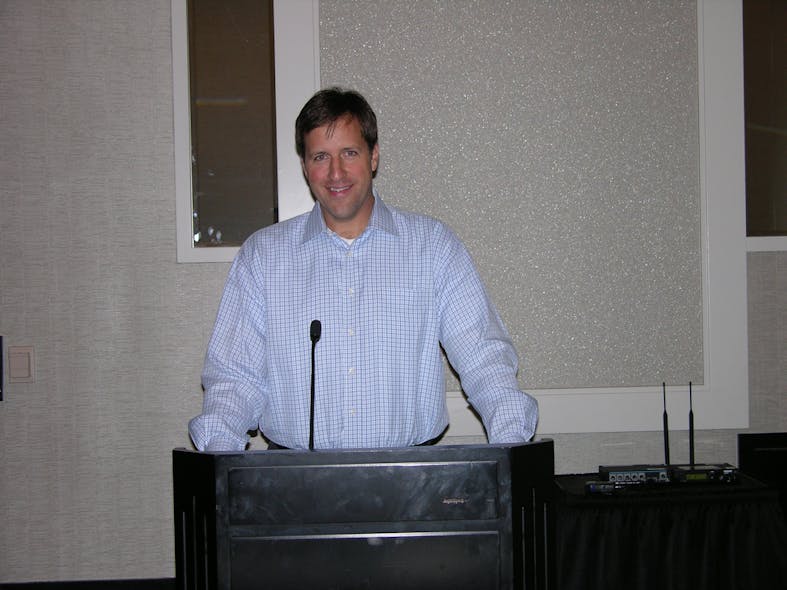Jeffrey Maloof of Isuzu Commercial Truck of America discusses Coffee Service Trucks with attendees at the 2012 CTW.