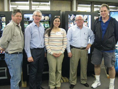 Tim Clemons of Clemons Vending, left; Jeff Beyer, AMS; Monica Minick, Lieberman; Marcus Connolly, Carlin O'Brien; and Steve Hadrits, Hadrits Vending, talk about vending innovation at the recent Lieberman Companies Spotlight Vending Show.