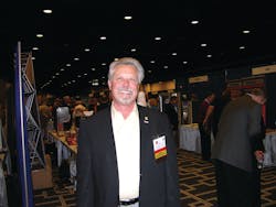 Pete Tullio, CFO of Gourmet Coffee Service Inc. in Van Nuys, Calif., and National Automatic Merchandising Association (NAMA) chairman of the board-elect walks the floor at CoffeeTea & Water 2012. Pete Tullio, CFO of Gourmet Coffee Service Inc. in Van Nuys, Calif., and National Automatic Merchandising Association (NAMA) chairman of the board-elect walks the floor at CoffeeTea & Water 2012.