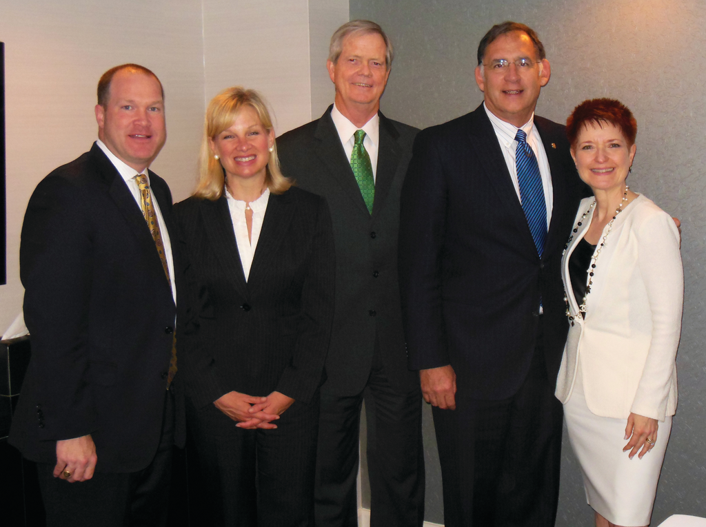 Eric Dell, senior vice President of NAMA, left; Roni Moore, vice president of NAMA; Dan Mathews, executive vice president of NAMA; Senator Boozman (Arkansas) and Carla Balakgie, president and CEO of NAMA meet to discuss legislative vending issues.