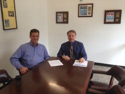 Dennis Thornton, right, owner of Vendedge couldn't run his business without the help of Operations Manager Mike Fleming. Dennis Thornton, right, owner of Vendedge couldn't run his business without the help of Operations Manager Mike Fleming.