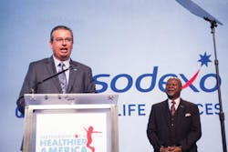 Sodexo President and CEO George Chavel joins Partnership for a Healthier America Board Chair James R. Gavin III, MD, PhD to announce the company&apos;s new commitments aimed at fighting childhood obesity at the 2014 Building a Healthier Future Summit in Washington. (PRNewsFoto/Sodexo)