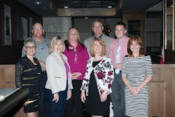 In the photo, first row, from left to right: Elaine Arena, Arena Communications (AAMC Legislative Consultant); Sandy Larson, NAMA Senior Director of Government Affairs; Arizona Rep. Heather Carter; Cathy Feeley, Focus 365 (AAMC Secretary). Second row, from left to right: Brian Loomis, Hershey (AAMC President); Rhonda Dunn, Machine Cuisine (AAMC Treasurer); Todd Elliott, Tomdra (NAMA Board of Directors); Maxwell Elliott, Tomdra (AAMC Vice President). In the photo, first row, from left to right: Elaine Arena, Arena Communications (AAMC Legislative Consultant); Sandy Larson, NAMA Senior Director of Government Affairs; Arizona Rep. Heather Carter; Cathy Feeley, Focus 365 (AAMC Secretary). Second row, from left to right: Brian Loomis, Hershey (AAMC President); Rhonda Dunn, Machine Cuisine (AAMC Treasurer); Todd Elliott, Tomdra (NAMA Board of Directors); Maxwell Elliott, Tomdra (AAMC Vice President).