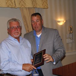 John Derrick, left, was awarded a Lifetime Achievement Award At the New England Spring Meeting by Jeff Terban, meeting chairman.