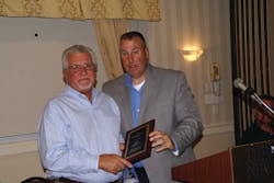 John Derrick, left, was awarded a Lifetime Achievement Award At the New England Spring Meeting by Jeff Terban, meeting chairman. John Derrick, left, was awarded a Lifetime Achievement Award At the New England Spring Meeting by Jeff Terban, meeting chairman.