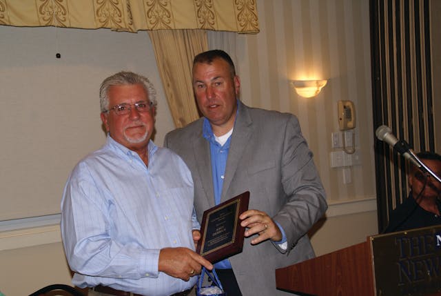 John Derrick, left, was awarded a Lifetime Achievement Award At the New England Spring Meeting by Jeff Terban, meeting chairman.