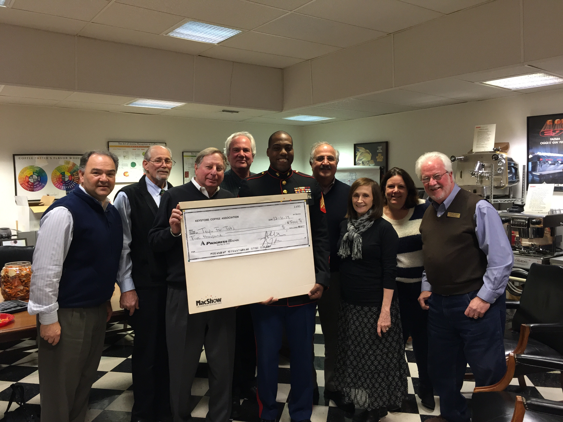Left to right, Michael Vlahos, Jim Walls, Dave Gellman, Dan Myers, Sergeant Darrell, Bob Melikian, Bonnie Natal, Mindi Ruths and Frank Oldt.
