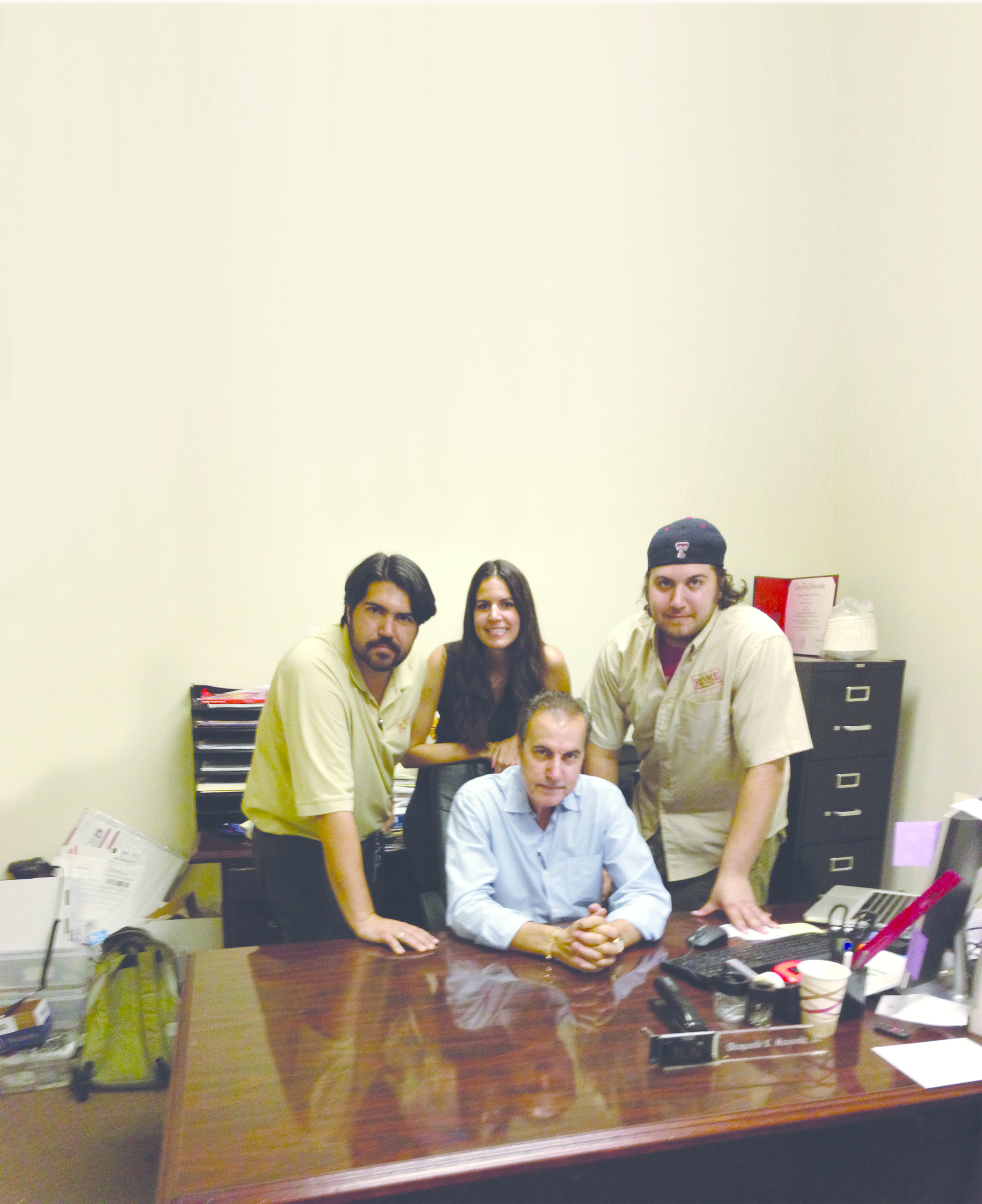 Dominic Macerola, center, started Rome Refershments in 1979. Now the business is run by him and three of his children, Gianpaolo, left, Piccola and Saverio.