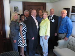 Illinois State Senator Tom Cullerton (center) with IAMC Legislative Day attendees. Illinois State Senator Tom Cullerton (center) with IAMC Legislative Day attendees.