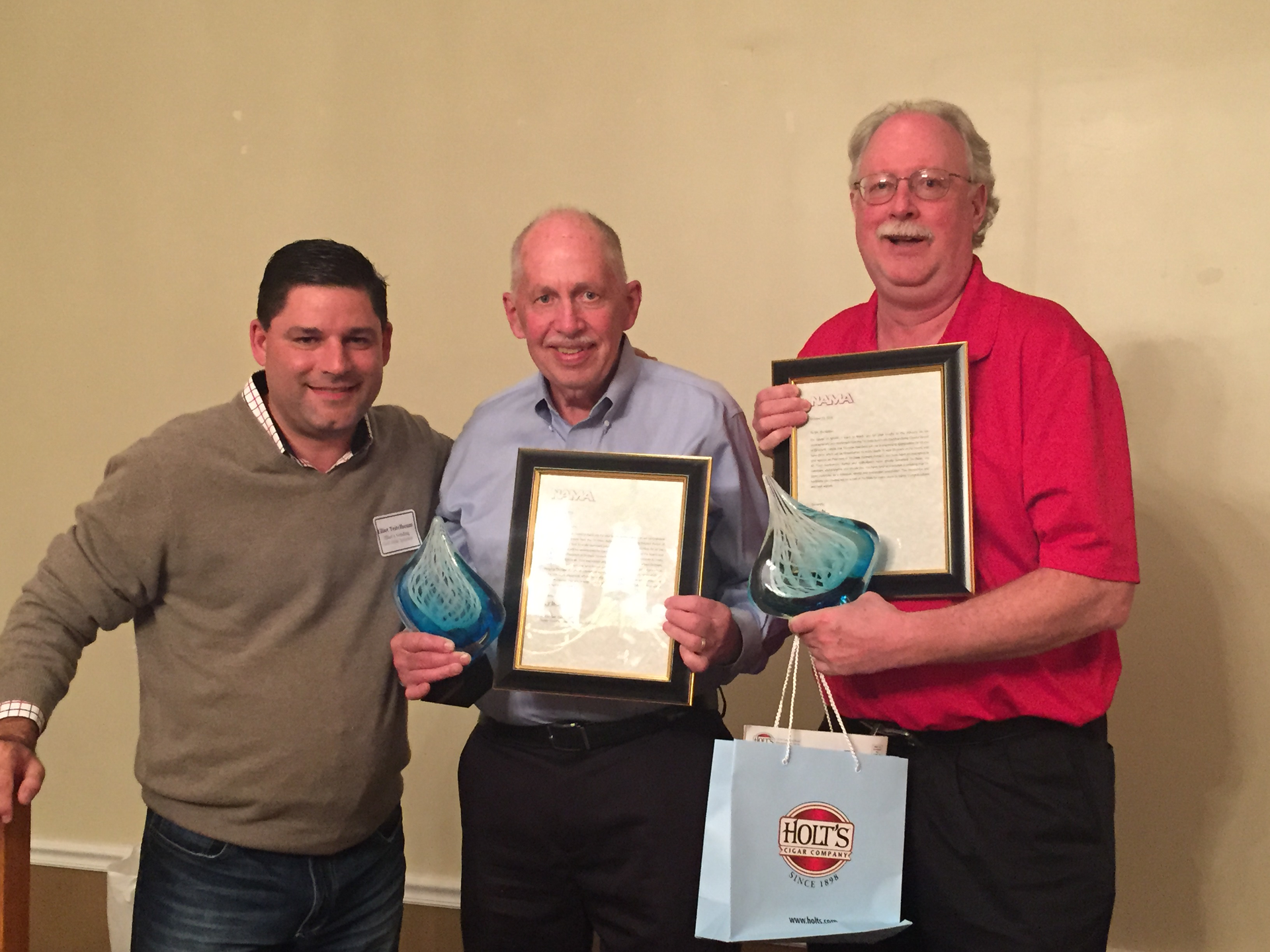 Elliot Teitelbaum, left, current Tri-State President, honors retiring past presidents Andy Calhoun and Jim Wittler.
