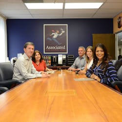 Tom Steuber is pictured with his management team comprised of Sherrie Flower, Geoffrey Saunders, Kimberly Lenz and Lani Jenkins.