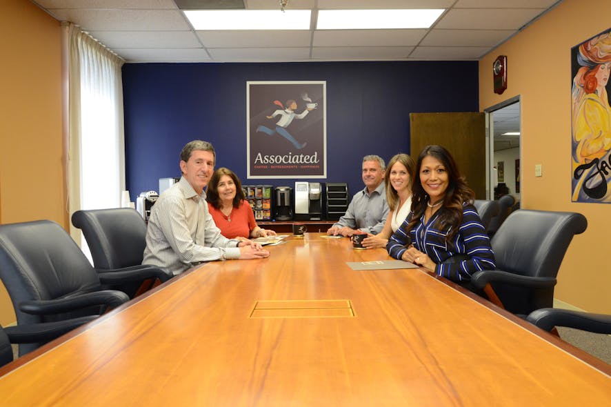 Tom Steuber is pictured with his management team comprised of Sherrie Flower, Geoffrey Saunders, Kimberly Lenz and Lani Jenkins.