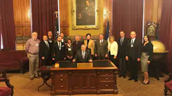 Charlie Lynch – Jackson Brothers, Roger Pepper – G & J Marketing, Rich Spicl – Treat America, Cody Otto – Otto Vending, Rod Nester – Smith Vending, Gail Starkweather – Hasty Tasty Food, Gaylen Starkweather – Hasty Tasty Food, Governor Terry Branstad (seated), Lieutenant Governor – Kim Reynolds, Jim Bocken – Farner-Bocken, Sandy Larson – NAMA, Matt Hoffman – Canteen, Darnell Huppert – Farner-Bocken, Ashilyn Sunderman – Smith Vending