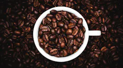 coffee beans in coffee cup 5a56434630d55