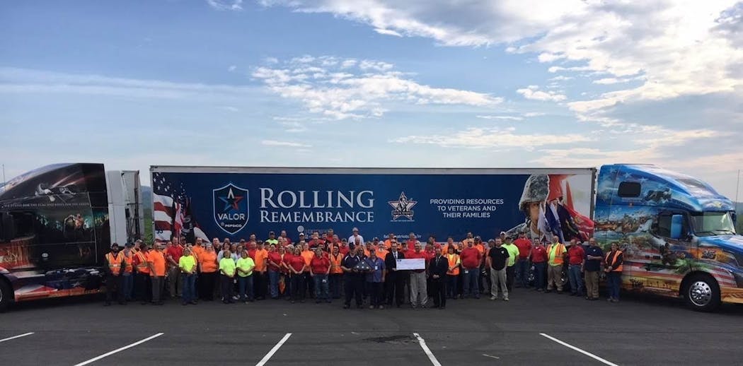 PepsiCo associates and other event attendees celebrate the Wytheville, Virginia stop of the 2018 PepsiCo Rolling Remembrance Relay