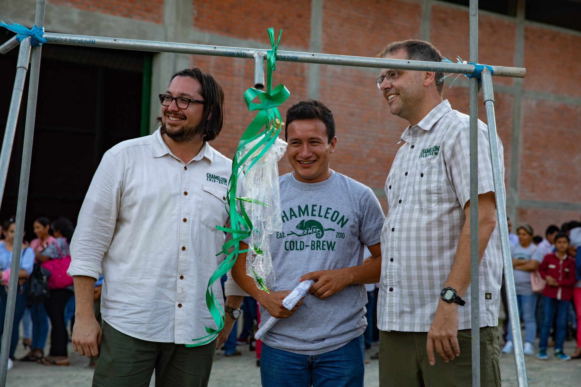 Chameleon Cold-Brew Director of Coffee Matt Swenson (L), Cenfrocafe Quality Lab Manager Herly Silva and Chameleon CEO and Co-Founder Chris Campbell (R) commemorate the opening of the Cenfrocafe Coffee Quality lab and milestone sustainability project with ribbon cutting ceremony in San Ignacio, Peru.