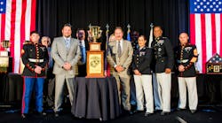 Back Row, Left to Right: Jay Stieber, Gary Walls, Sam Facchini, Dawn Sweeney, Capt. Derrick Oliver. Front Row, Left to Right: Cpl. Brady Wocher, Andrew Bessemer, Barry Lee, W.O. Maria Marques, Major General Craig Crenshaw, and MGySgt Brian Blanton.