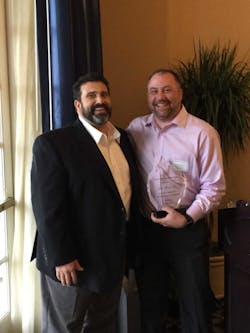 Newly-elected Tri-State President Scott Bidding (L) presents outgoing President Jeff West, Jr. with an award in appreciation for his service and dedication to Tri-State. Newly-elected Tri-State President Scott Bidding (L) presents outgoing President Jeff West, Jr. with an award in appreciation for his service and dedication to Tri-State.