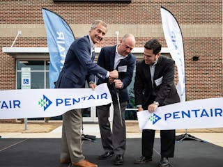 Pentair President and CEO, John Stauch, Steve Risner, Sr. Director of Technology, and Phil Rolchigo, Chief Technology Officer, celebrated the opening of Pentair&apos;s new innovation center in Apex, N.C.