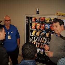 Crane Merchandising Systems associates showcase opportunities in the vending industry to middle school students at the company&apos;s 2019 Career Day. The event, held March 7, was part of Crane&apos;s celebration of the inaugural National Vending Day.